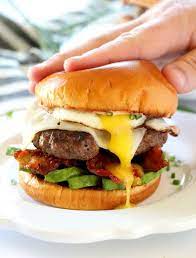 Brunch Burger With Avocado Bacon And A Fried Egg Dash Of Savory Recipe Brunch Burger Bacon Brunch Brunch