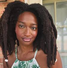 mayowasworld ❤️👑 It's a 4 year time difference between the first photo and  last ✨ which means I've been growing my Freeform locs for like 8 years now?  My roots are so