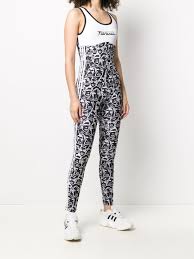 Todas las colecciones y estilos en la tienda oficial adidas.es. Fiorucci X Adidas Faces Print Jumpsuit Farfetch