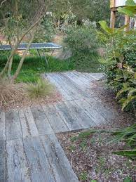 Use shovel to dig out path to 100mm (depth of sleepers), making base level. Pin By Tuula Ihamuotila On Client Inspiration Wooden Garden Path Garden Path Ideas Garden Paths