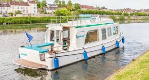 Thanks to its small size (9,30m), this comfy boat will perfectly suit a couple or a couple with a child. Penichette 950 E Canal Boat For Rent Locaboat