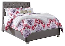 This platform bed is detailed with button tufts and padding for extra comfort. Coralayne Full Upholstered Bed Ivan Smith