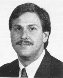 Did someone really throw a brick through Bill Curry's office window in  1988? The short answer is 'yes'