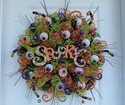 We chose to hang this sign off the bottom of the wreath which really makes it a fairly large display. 13 Amazing Diy Halloween Mesh Wreath Ideas