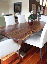 A solid slab dining table can put a whole dining room together. Dining Table Modern With Walnut Slab Modern Dining Table Wood Dining Table Walnut Slab Dining Table
