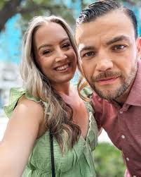 Who is in the photos with the person