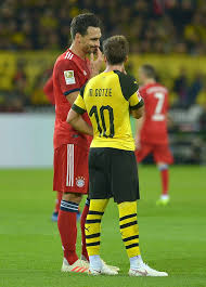 Dortmund Germany November 10 Mats Hummels Of Bayern Muenchen Speak With Mario Goetze Of Borussia Dortmund During Th Borussia Dortmund Bvb Dortmund Dortmund