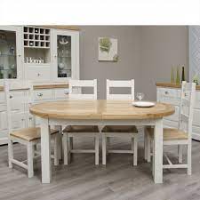 Extending dining tables extendable dining tables are the perfect addition to your dining room if you have a large family, like to host dinner parties, or if you have an open house at christmas. Deluxe Painted Oak Oval Extending Dining Table Free Delivery