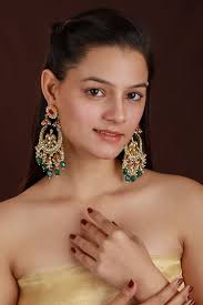 Buy Shreenath glory earrings by Apala by Sumit at Aashni and Co