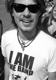 I am the Band" did he honestly wear this? If so, I hate him even more than  I did lol