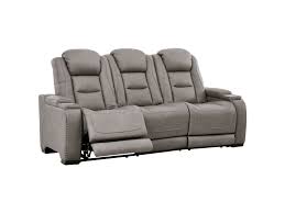 Make that sofa a reclining sofa, and you have the ultimate relaxation pleasure you can find. Signature Design By Ashley The Man Den Contemporary Power Reclining Sofa With Adjustable Headrest And Lumbar Support Royal Furniture Reclining Sofas