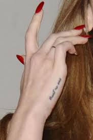 Lana del rey has interesting tattoo collections decorating her glamorous glowing skin. Lana Del Rey S 6 Tattoos Meanings Steal Her Style