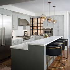 The kitchen industry's leading manufacturers say that while white cabinets continue to be tops, gray is the shade they're betting on to break white's top spot. Chic Gray Kitchen San Diego Home Garden Lifestyles Kitchen Renovation Kitchen Design Kitchen Island Height