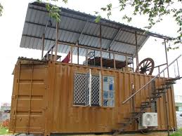 We used six cargo shipping containers to build a gorgeous, modern home with three fully functional bedrooms and bathrooms. Shipping Container Home In Bangalore Left Side Elevation Inhabitat Green Design Innovation Architecture Green Building