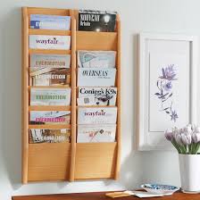 We manufacturer wall mounted racks to display literature on your walls. Red Barrel Studio Yanira 14 Pocket Wall Mount Magazine Rack Reviews Wayfair