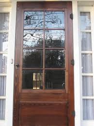 Vintage Styled Wood Storm Door With Solid Teak Wood Material Built In And Using Clear Glass For The Do Wood Storm Doors Wooden Screen Door Screen Door Hardware