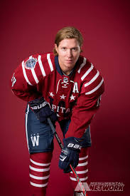 The 2015 capitals nhl winter classic jersey includes many elements from capitals jerseys worn during the past five decades. Nicklas Backstrom Shows Off The Caps 2015 Bridgestone Nhl Winter Classic Jersey Washington Capitals Hockey Capitals Hockey Nhl Winter Classic