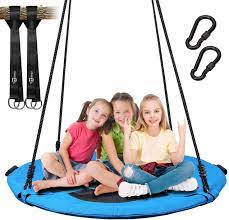 The type of tree swing you want and how large it should be are major considerations. Amazon Com Trekassy 700lb Saucer Tree Swing For Kids Adults 40 Inch Textilene Wear Resistant Waterproof Frame Includes 2 Tree Hanging Straps Toys Games