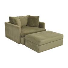 A club chair has a deep sitting base, raised armrests and a cozy back. 72 Off Crate Barrel Crate Barrel Lounge Ii Chair And A Half With Storage Ottoman Chairs