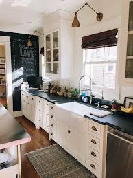 Craftsman Bungalow Kitchen With White Cabinets And Black Honed Granite Countertops Craftsman Kitchen Cabinets Craftsman Kitchen Cabinets White Bungalow Kitchen