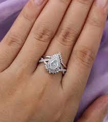 Pear Shaped Moissanite Engagement Ring Set White Gold Halo Etsy In 2021 Vintage Engagement Rings Beautiful Engagement Rings Rose Gold Engagement Ring