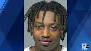 Milwaukee man accused of robbing Qdoba, climbing in ceiling charged