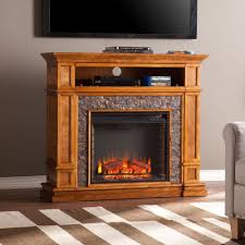 Led lights create the realistic flickering flames and glowing embers to give it the feel of an authentic fire, while a front of. Southern Enterprises Ethan 45 In Simulated Stone Media Center Electric Fireplace Tv Stand In Faux Black River Stone Hd864143 The Home Depot