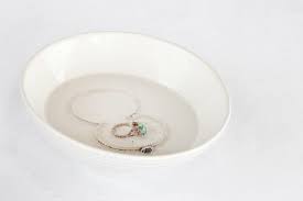 Tired of spending money on cleaning silver?well,here is an easy way to clean out the tarnish off those beautiful silver jewelry,coins or idols that you have. How To Clean Silver Jewelry With Vinegar Cleaning Silver Jewelry Clean Sterling Silver How To Clean Sterling Silver