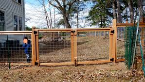 Then, secure the wire to the first post using the metal clips that are attached to the post. Building Quality Hog Panel Wood Fences In The Twin Cities