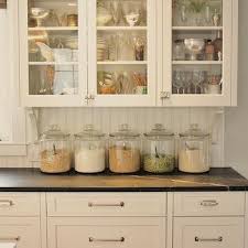 She chose white dove for the wall cabinets, which added an enormous amount of lightness to the room, and grounded the space with the black island. Benjamin Moore White Dove Kitchen Cabinets Design Ideas