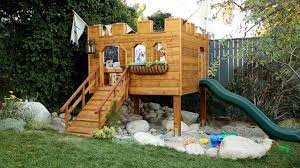 Some of the most reviewed products in wood playhouses are the backyard discovery scenic heights cedar playhouse with 87 reviews and the kidkraft white modern outdoor playhouse with 72 reviews. Building Our Backyard Castle With Wood Naturally Fort Roundup Emily Henderson