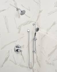 The handheld unit either screws onto the end of the shower arm or fits onto a bracket that's mounted to the wall, depending on the model. Premium 3 Setting Slide Bar Hand Shower 57021 Delta Faucet