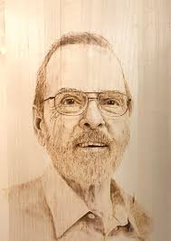 Sealing wood engraving without spreading particles?