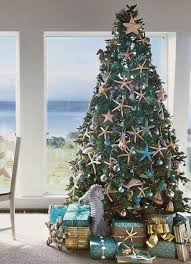 Are you planning a coastal or beach christmas tree decorating theme this year? Coastal Living Magazine Christmas Trees Coastal Christmas Tree Best Christmas Tree Decorations Tropical Christmas Decorations