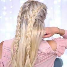 Starting with one side, braid down and secure with a clear elastic. Two Dutch Braids Half Up Half Down Credit Roxxaurus Do To Dutch Braids From The Front Of Your H Dutch Braid Half Up Braid Half Up Half Down Straight Hairstyles