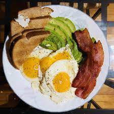 Homemade Bacon Grease Cooked Sunny Side Up Eggs American Breakfast Homemade Breakfast Breakfast For Kids Healthy Breakfast