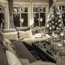 Group small collectibles for impact credit: Pinterest Amberac Christmas Living Rooms Elegant Christmas Christmas Room