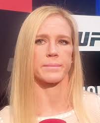 Whoever said you have to choose between long hair and uninterfered training is dead wrong. Holly Holm Wikipedia