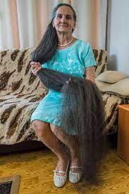 Long wavy hair is attractive right now, so grab your curling iron or deep waver to create some fun hairstyles that look great for any season! Grandmas Hair Tho Long Gray Hair Long Hair Stories Huge Hair