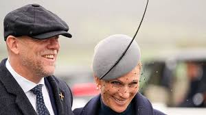Zara and Mike Tindall swerve royal drama to brave Cheltenham Festival in  pouring rain
