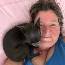 Chihuahua addicted to neck sleeping