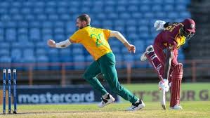 Match referee sir richie richardson (left) with west indies captain kieron pollard (centre) and south africa captain temba bavuma at the toss. 8u0zdjtzianwym