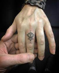 We did not find results for: Tiny Lotus On The Finger By Kirk Budden Tattoogrid Net
