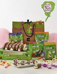 Marks and spencer's colin the caterpillar cake inspired aldi to make cuthbert the caterpillar, and now m&s is suing aldi over the likeness. Colin The Caterpillar Turns 30 Today And M S Has Put Together An Epic Colin Gift Bag To Celebrate Daily Record