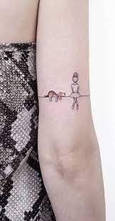 Unique Dog Ballerina Landscape Back Of Elbow Tattoo Ideas For Women Ideas Unicas Del Tatuaje Del Pequeno Perr Unique Tattoos For Women Tattoos Trendy Tattoos