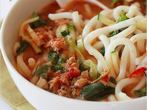 Penang asam laksa with noodles, fish and herbs