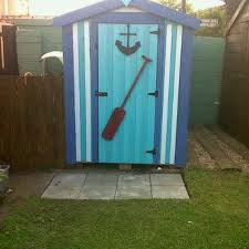 The paints are quick to dry. How To Paint A Wooden Shed And A Concrete Wall In The Garden Dengarden