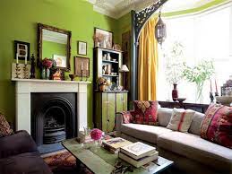 The house designers this is the formal dining room of the house with a majestic decorative chandelier hanging over the dark wood dining table that is warmed by the romantic fireplace topped with a large painting. Interior Victorian House Paint Colors Novocom Top