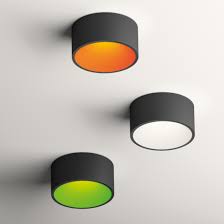 The base of a close to the ceiling light is attached directly to the ceiling. Vibia Domo Coloured Ceiling Light Darklight Design Lighting Design Supply