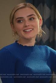 WornOnTV: Taylor's blue ruffle neck top